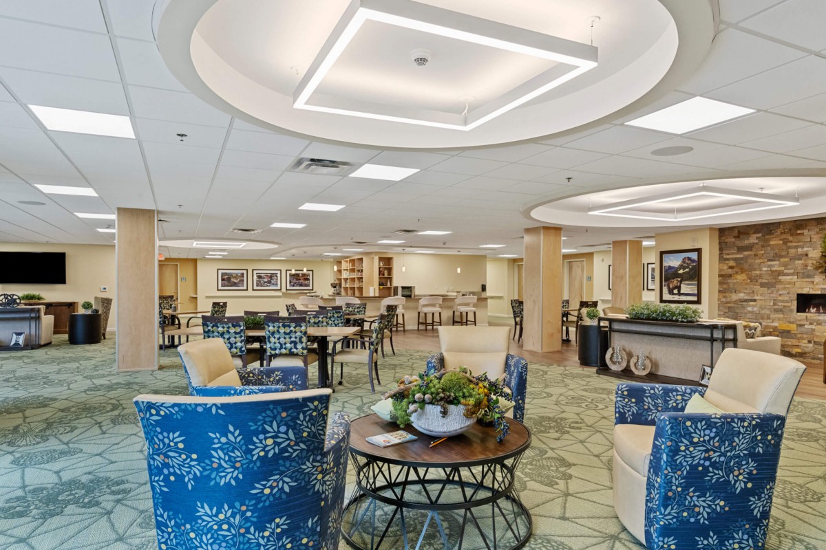 Modern lobby with comfortable seating and decorative plants.