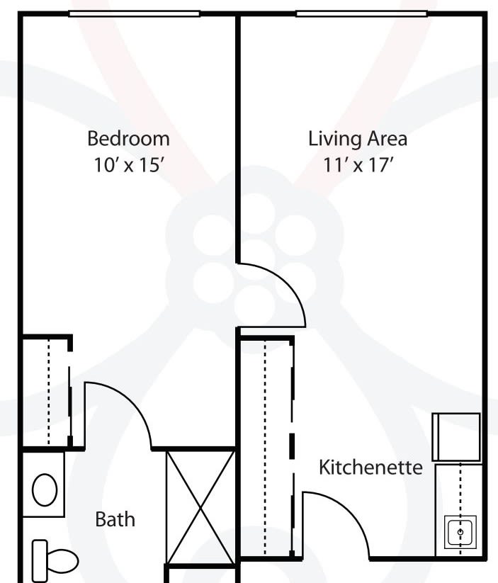 A simple floor plan illustrating the layout of a small apartment with a bedroom, living area, kitchenette, and bathroom.
