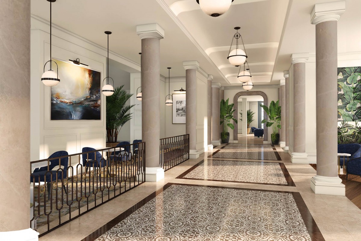Elegant hallway with stylish lighting, artwork, and seating areas.