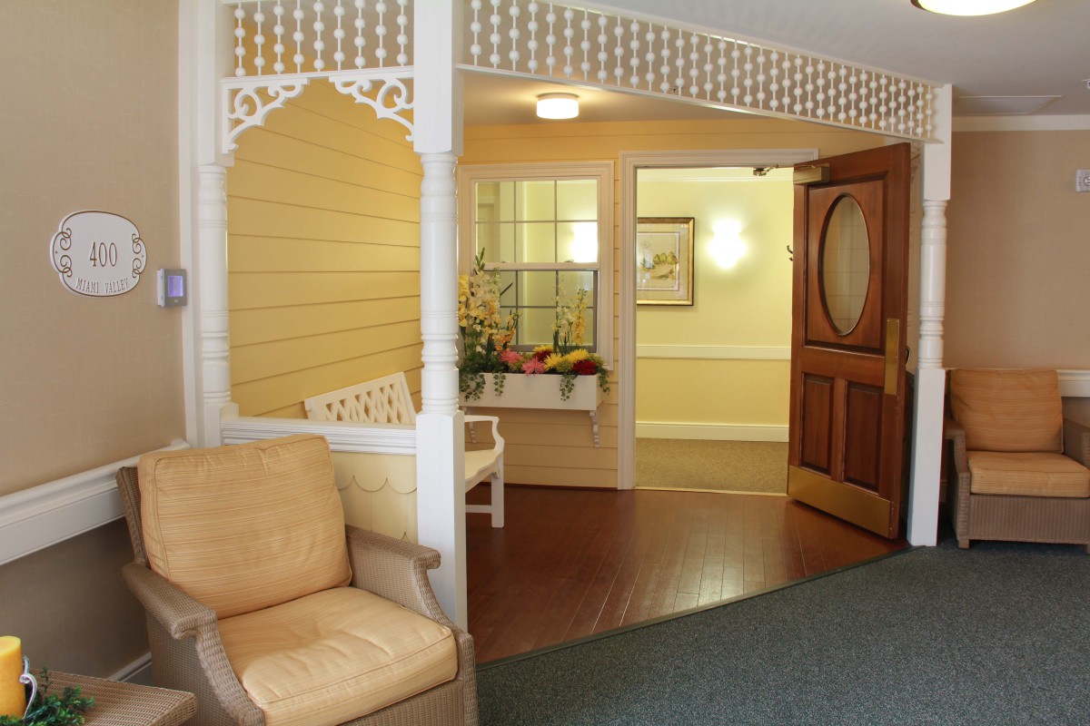 A cozy lobby interior with a warm color scheme and comfortable seating.