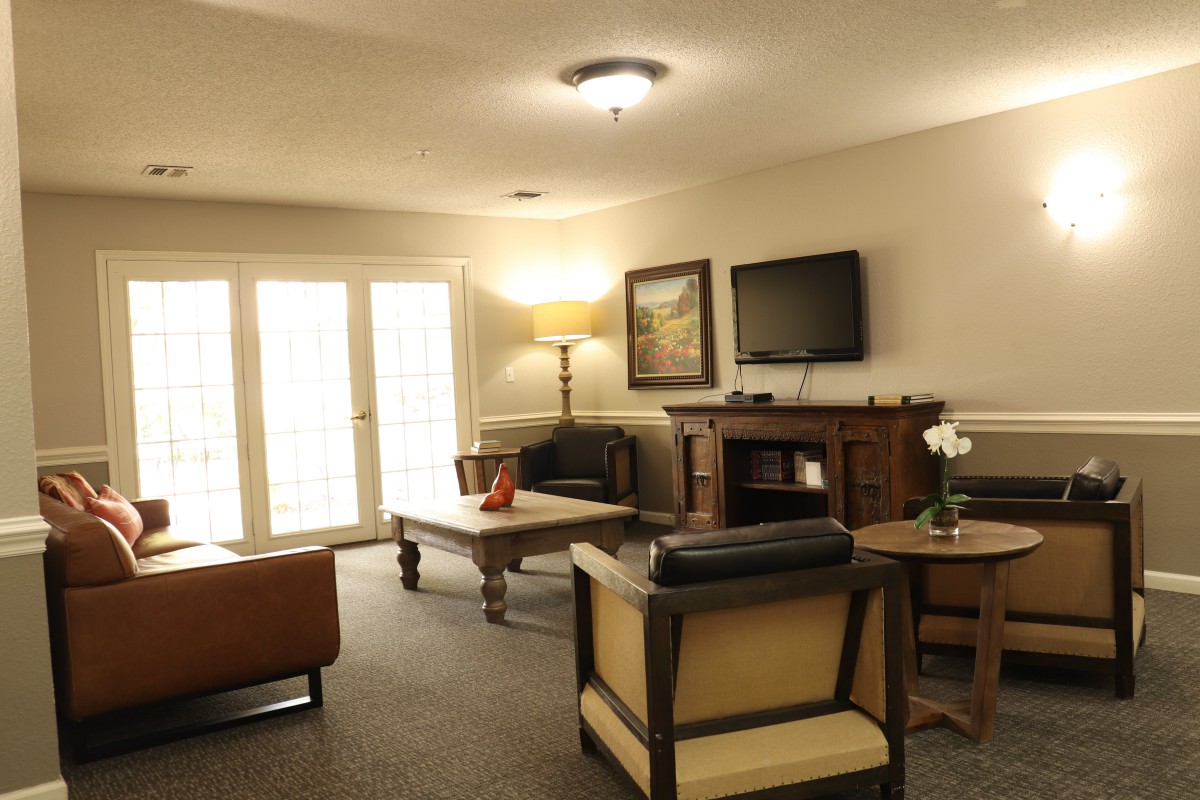 A cozy living room with comfortable seating and a warm ambiance.