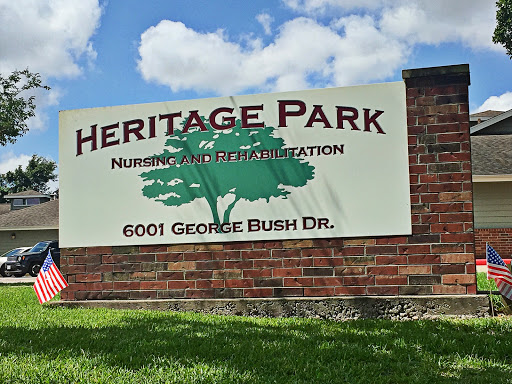 Heritage Park sign indicating a facility for rehabilitation located on George Bush Drive.