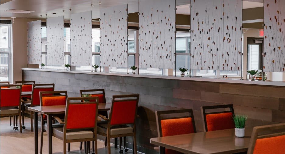 A modern restaurant interior with stylish seating and decor.