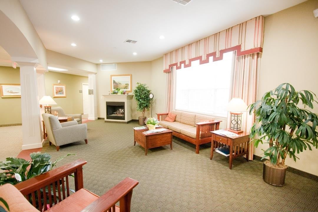 A cozy living room with comfortable seating and warm decor.