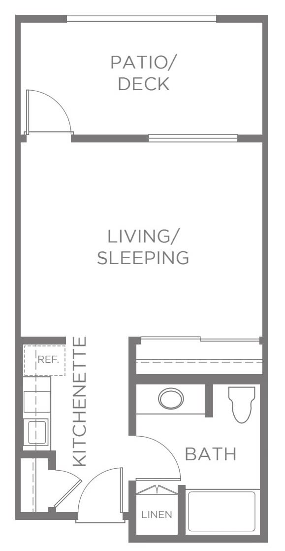 A floor plan of a studio apartment featuring a living/sleeping area, kitchenette, and bathroom.