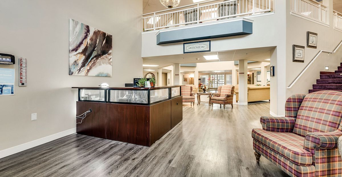 A modern and spacious reception area with contemporary furniture and artwork.