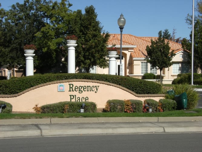 Entrance sign of a residential community named Regency Place.