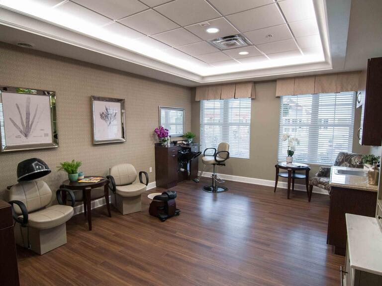 A waiting room with comfortable seating and natural light.