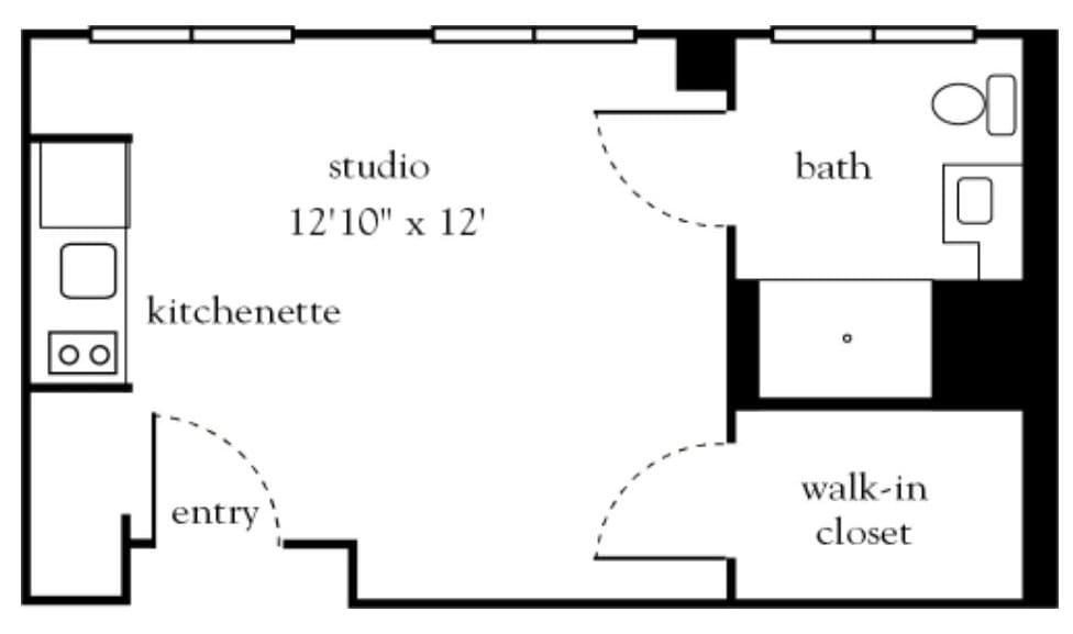 Floor plan of a studio apartment with kitchenette, bathroom, and walk-in closet.