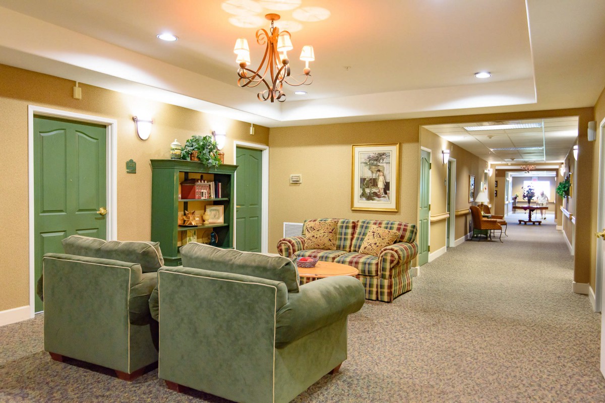 Cozy living room with comfortable seating and warm lighting.