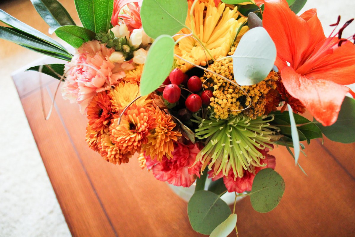 A vibrant bouquet of mixed flowers with diverse colors and textures.