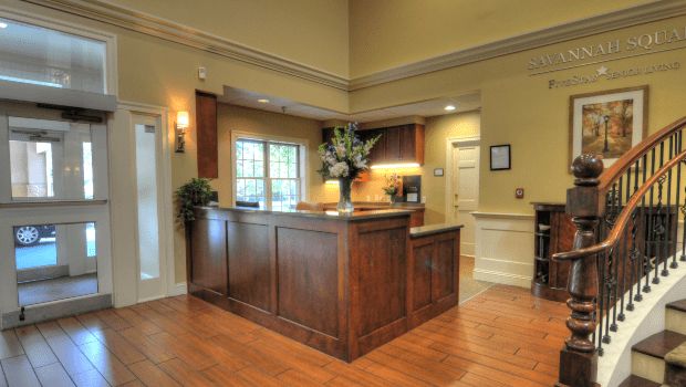 A welcoming reception area with wooden furniture and decor.