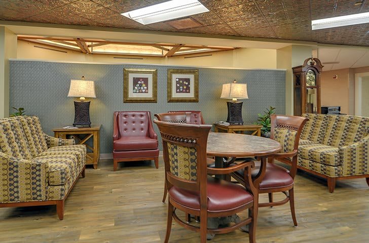 A cozy lounge area with comfortable seating and elegant decor.
