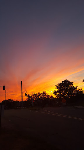 A breathtaking sunset painting the sky with vibrant hues of orange and purple.