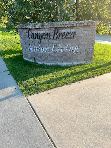 Entrance sign for Canyon Breeze Senior Living facility.