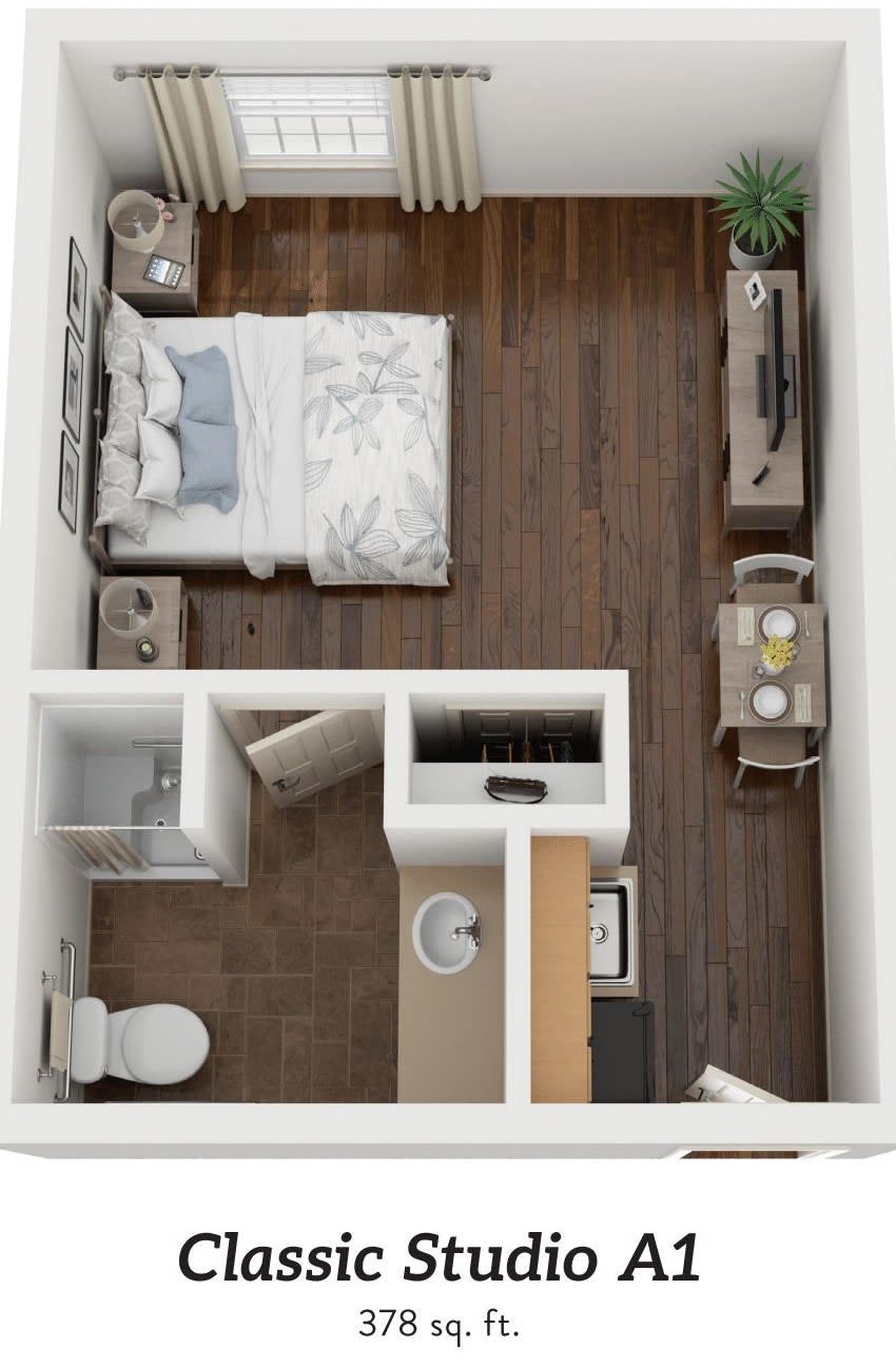 A compact floor plan featuring a bedroom, bathroom, and living area.