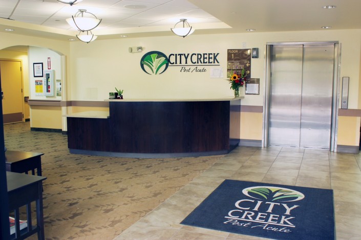 City Creek facility reception with branded decor and a welcoming front desk.
