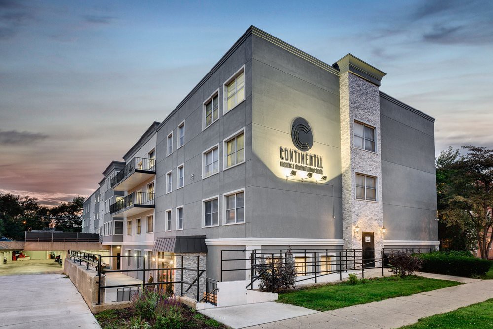 Modern apartment building exterior with sleek design.