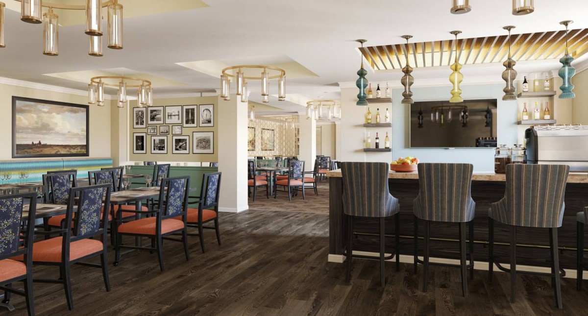 A cozy restaurant interior with a mix of dining tables and bar seating, featuring elegant chandeliers and wooden flooring.