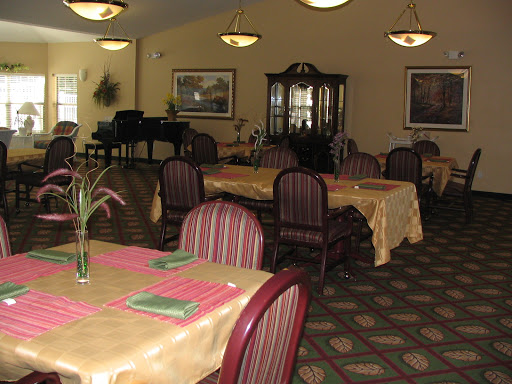 A welcoming dining area featuring elegantly arranged tables and chairs.