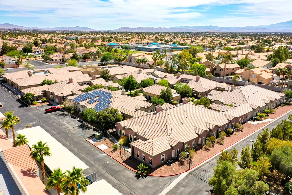 Aerial view of a suburban residential neighborhood with houses and streets.