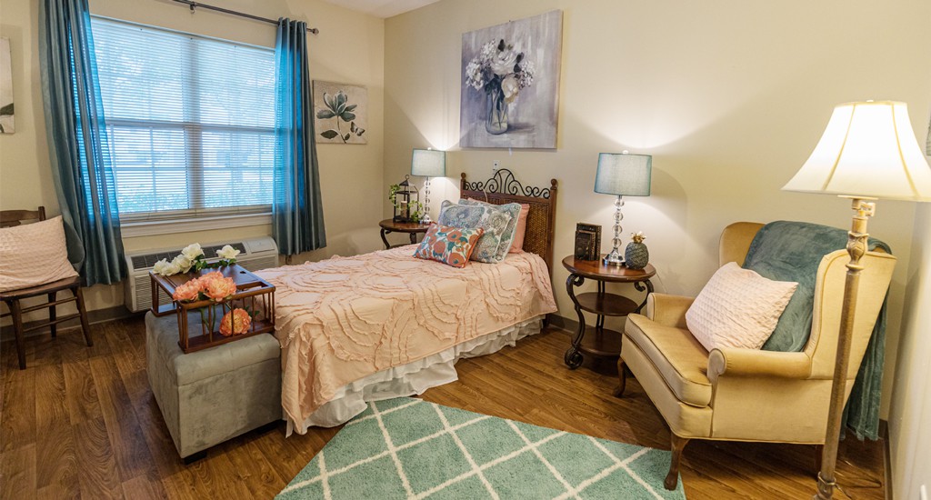A cozy bedroom with elegant decor and comfortable furniture.