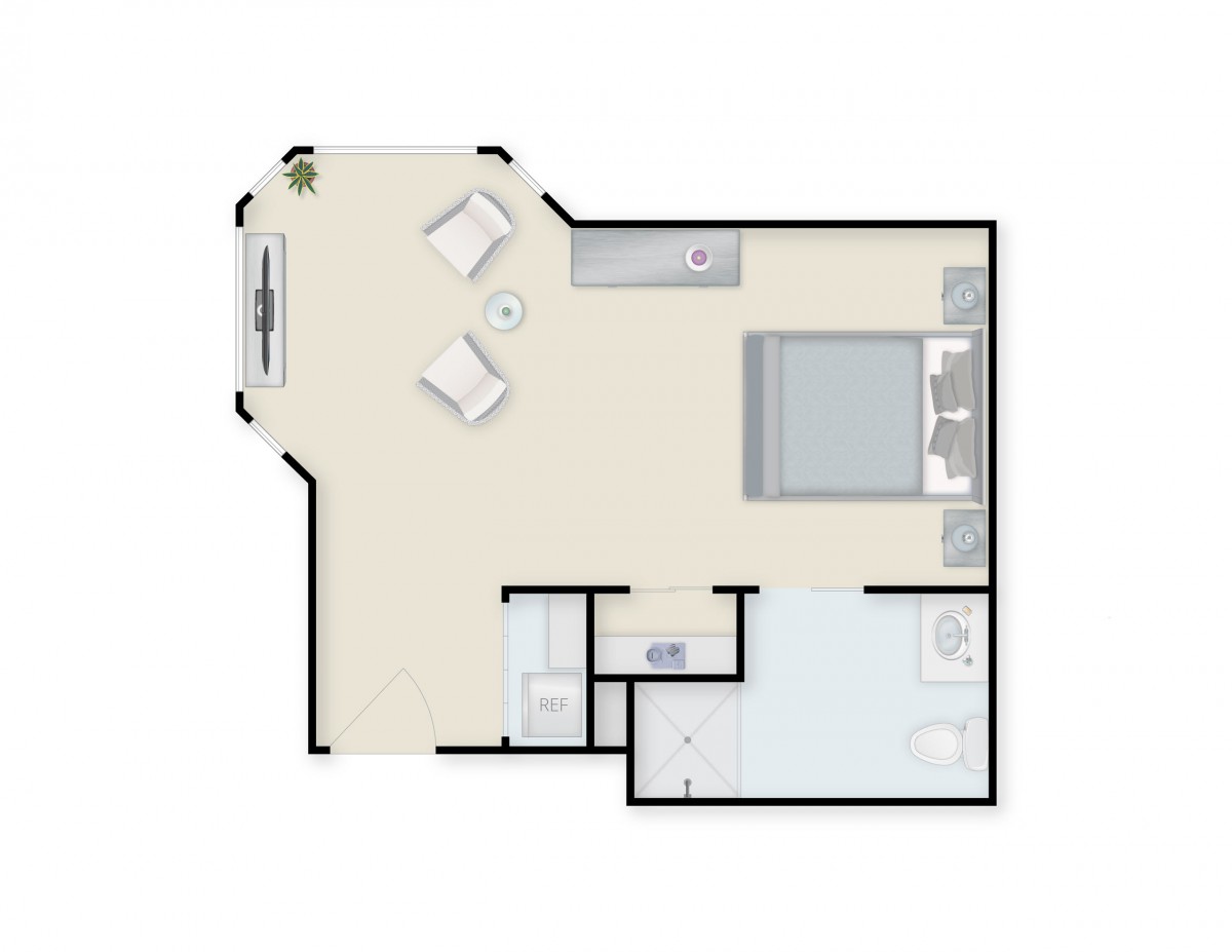 A floor plan of a one-bedroom apartment showing the layout with a living area, bedroom, kitchenette, and bathroom.