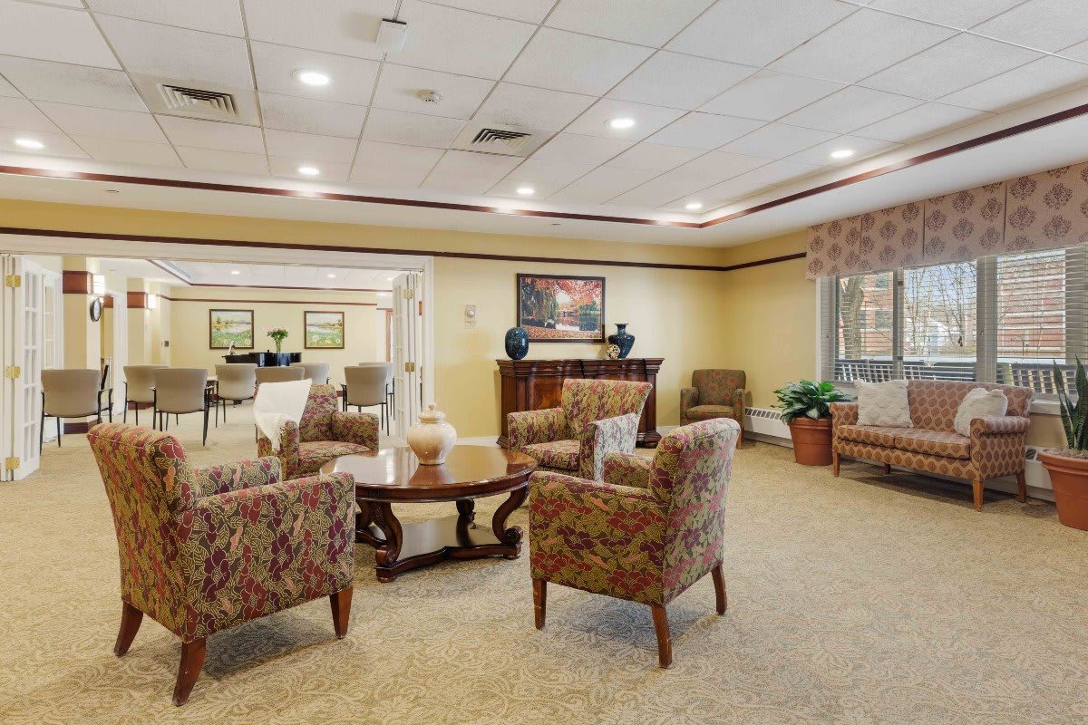 A cozy lobby area with comfortable seating and warm lighting.