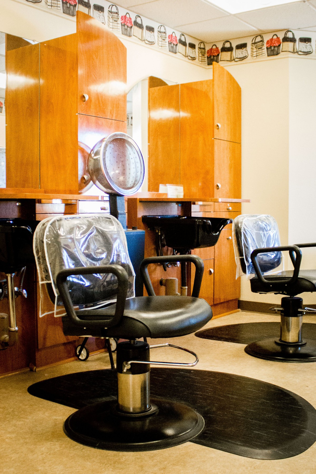 Empty salon chairs in a hairdressing studio.
