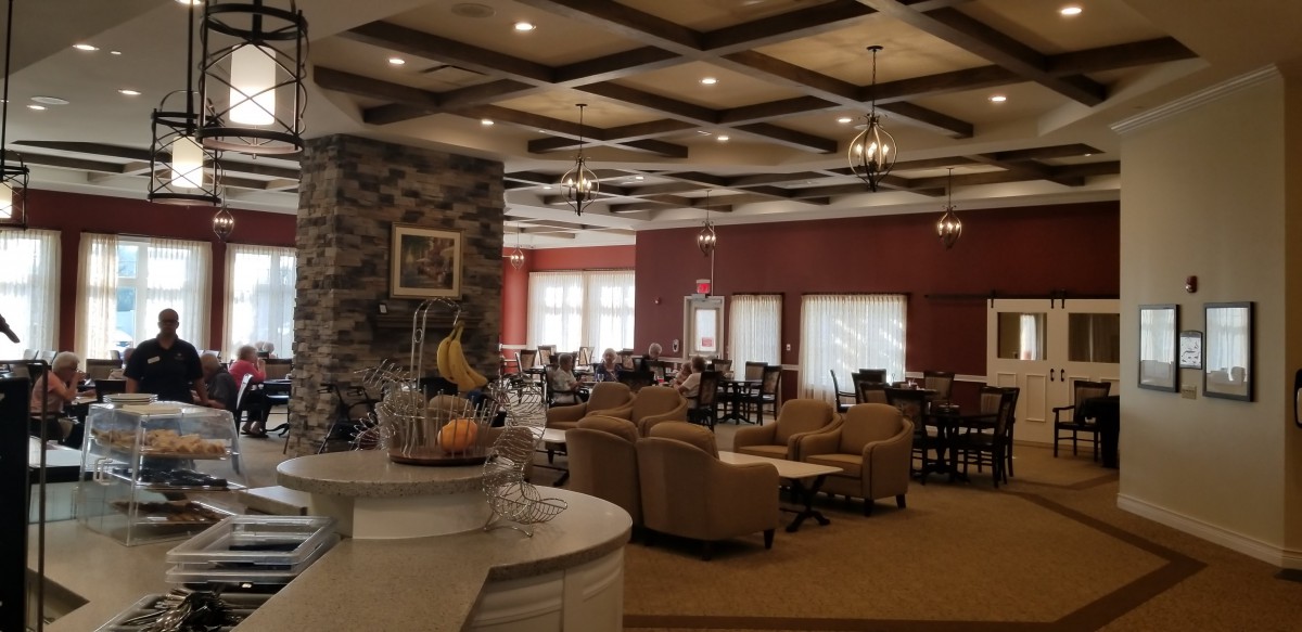 A cozy dining area with comfortable seating and warm lighting.
