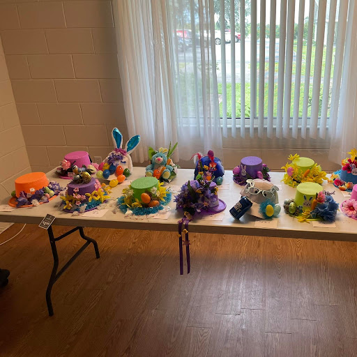 A vibrant display of colorful decorations set on a table, showcasing various festive crafts.