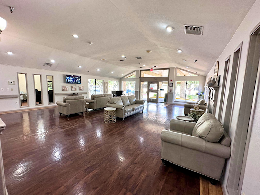 A welcoming and spacious lobby area featuring modern furniture and plenty of natural light.