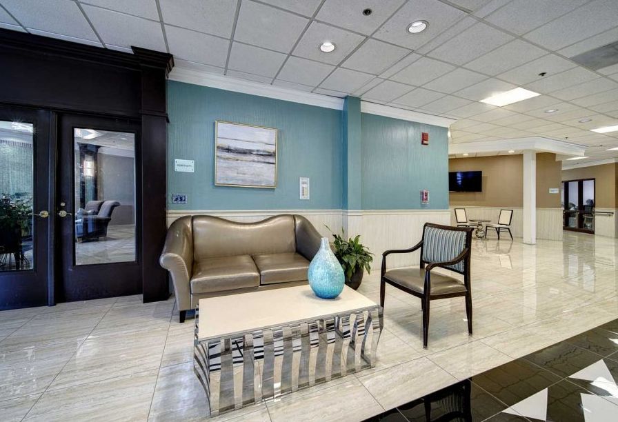 A modern lobby area featuring stylish seating and decor.