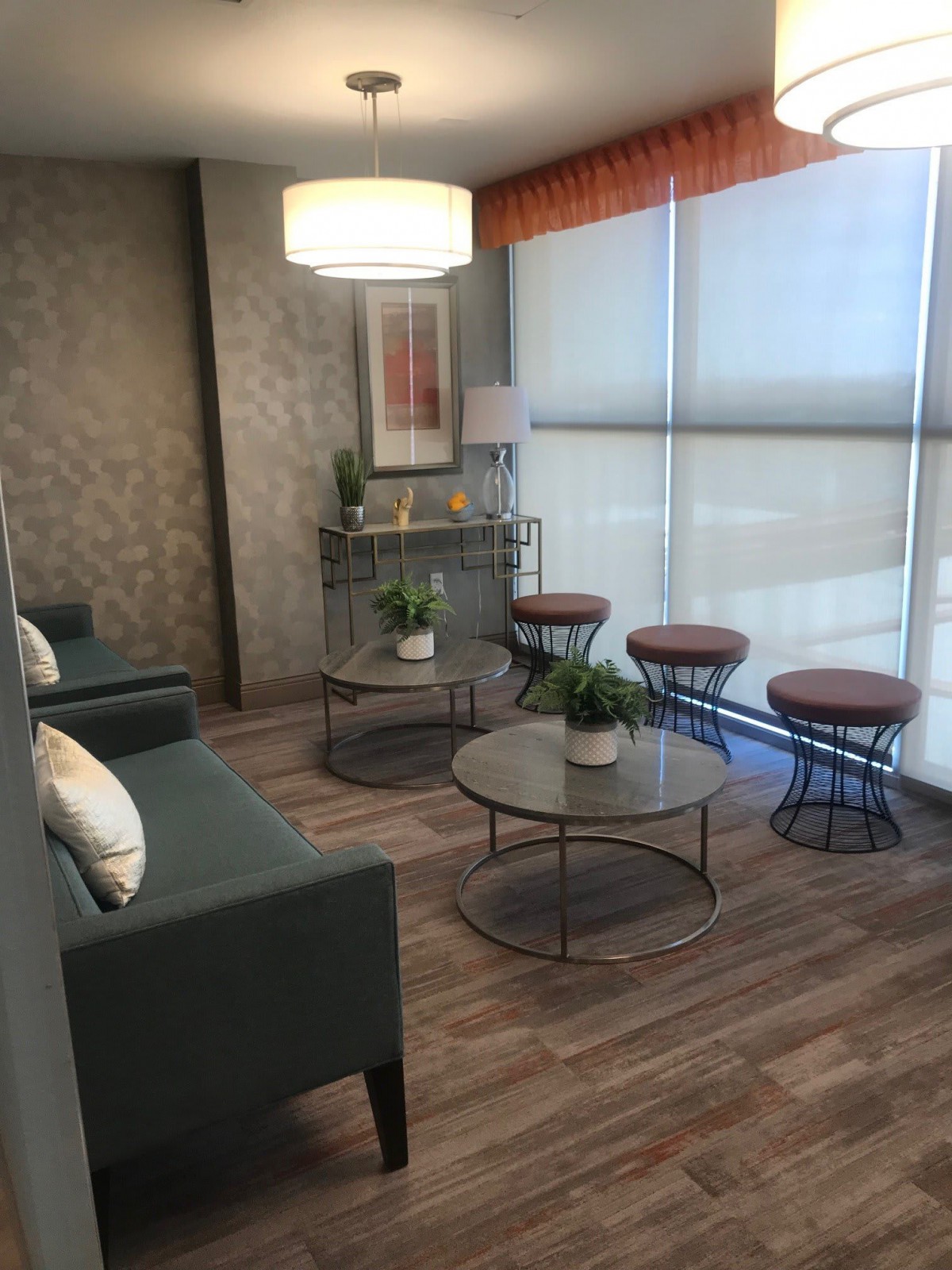 A modern waiting room with stylish seating and natural light.