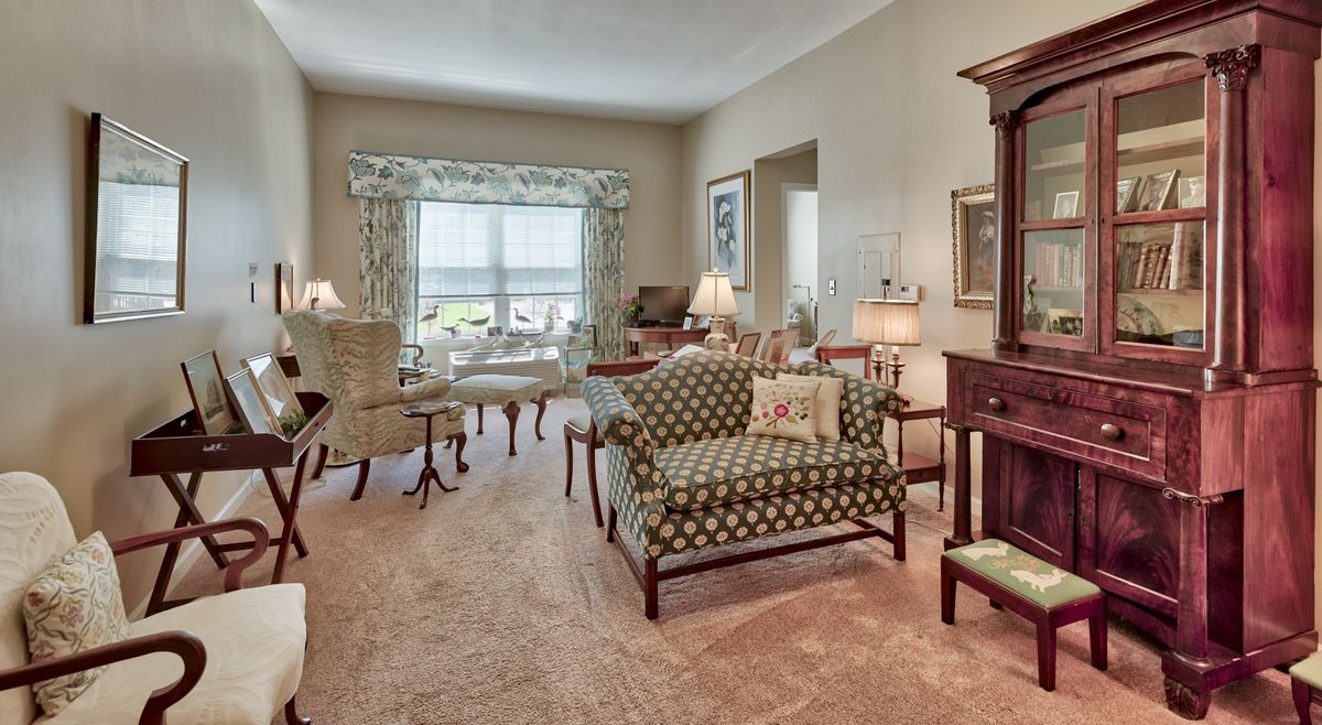 A classic living room with elegant furniture and decor.