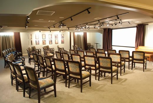 A neatly arranged conference room set up for a presentation.