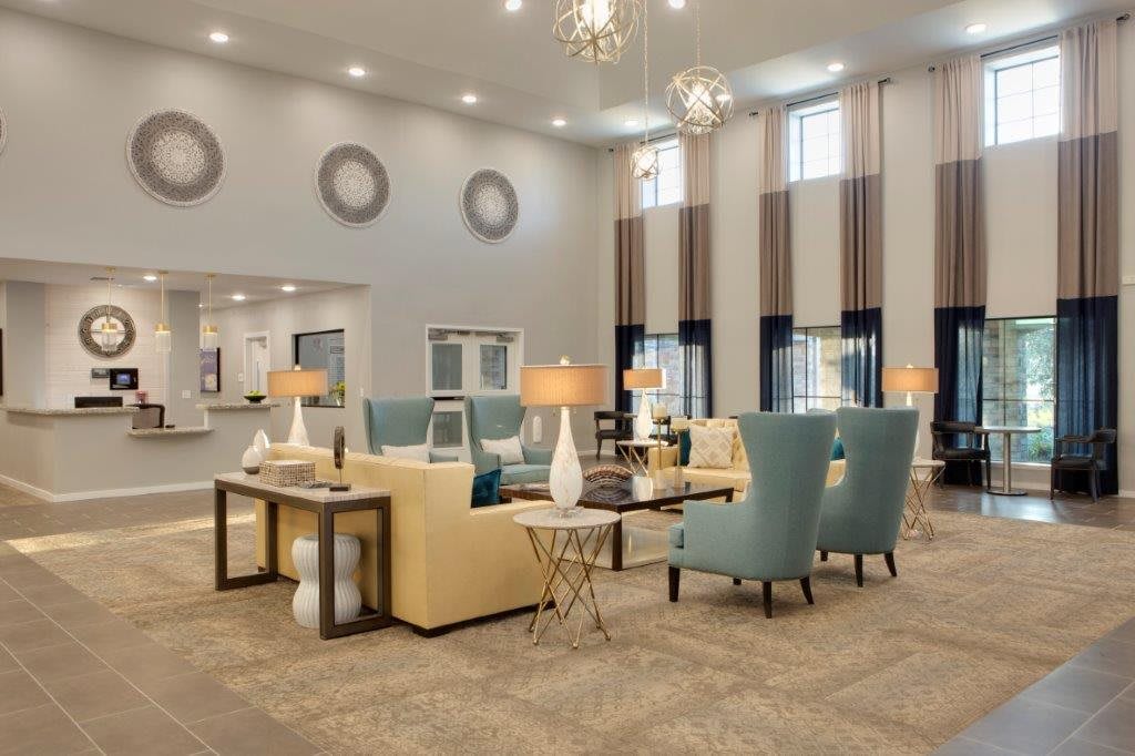A modern living room with stylish furniture and elegant decor.