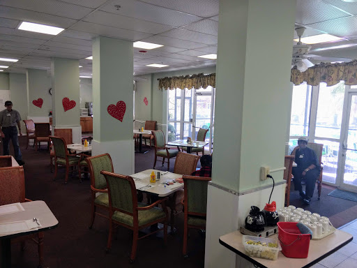 A cozy dining area decorated with heart motifs, inviting a warm atmosphere for guests.