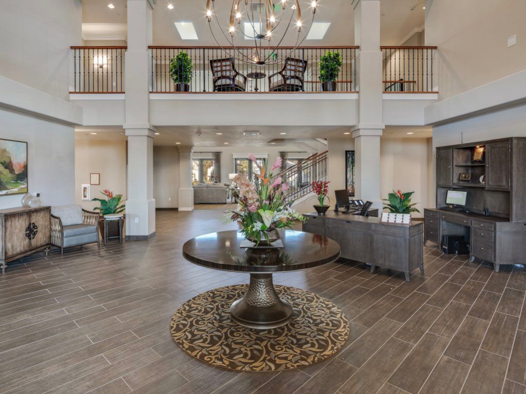 Spacious lobby area with elegant decor and furnishings.