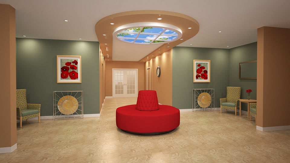 A modern lobby with a central red sofa and a decorative ceiling mural.