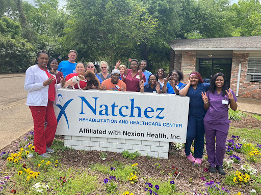 The dedicated team at Natchez Rehabilitation and Healthcare Center gathers for a group photo, showcasing their commitment to care and community.