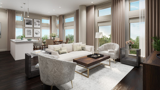 A stylish and modern living room featuring a comfortable sofa, elegant coffee table, and ample natural light.
