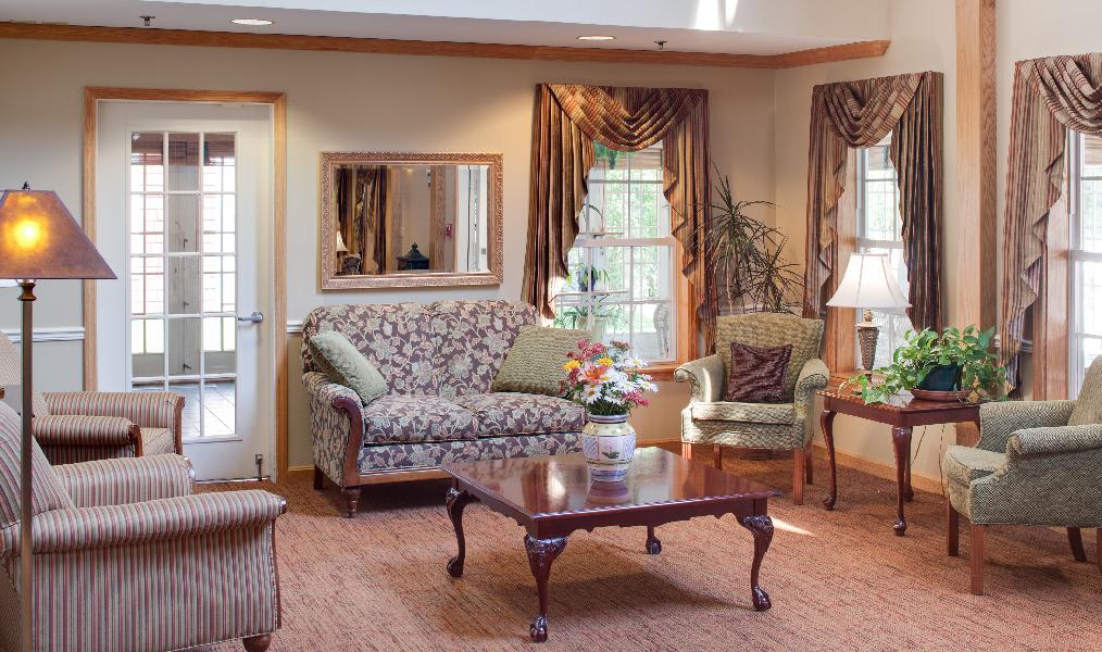 A cozy living room with classic furniture and elegant decor.