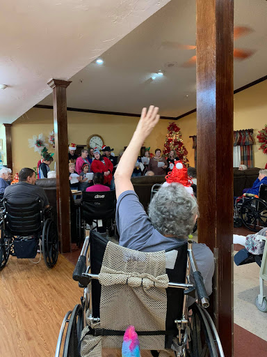 Residents actively engaging during a musical performance in a community setting.