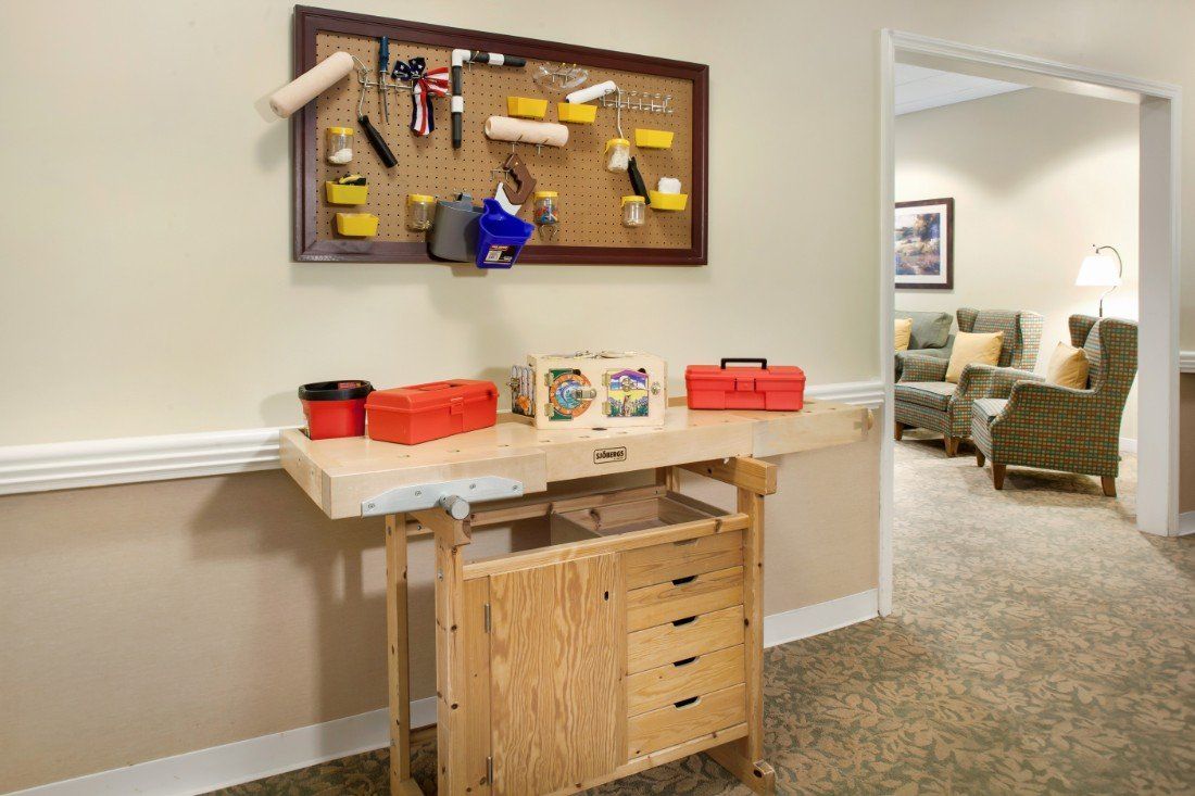 A well-organized workbench with tools and storage options.