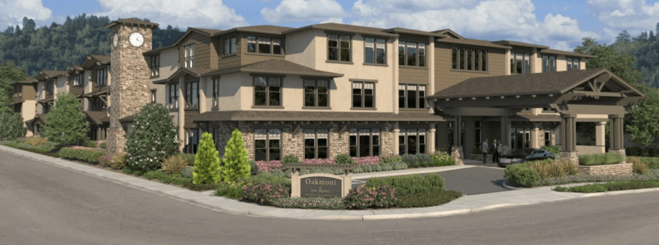 A modern residential building with well-maintained landscaping.