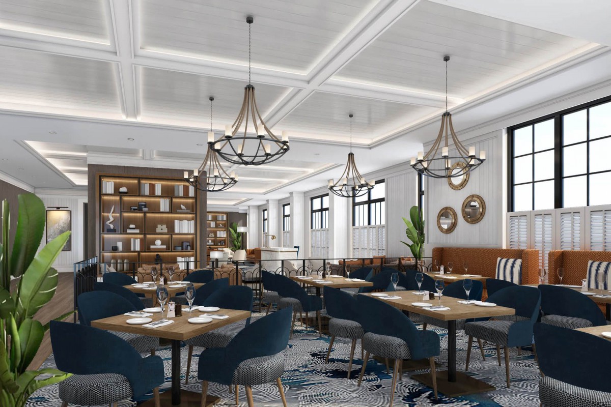 A modern restaurant interior with elegant chandeliers and a stylish dining area.