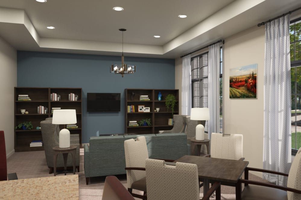 A modern living room with a blue accent wall, comfortable seating, and tasteful decor.