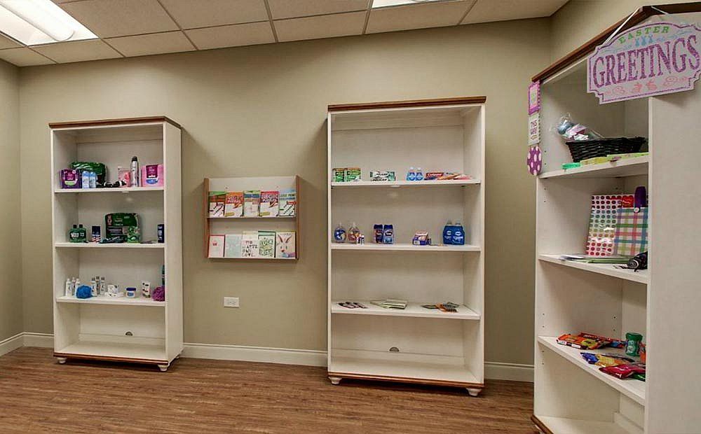 Interior view of a store with products displayed on shelves.