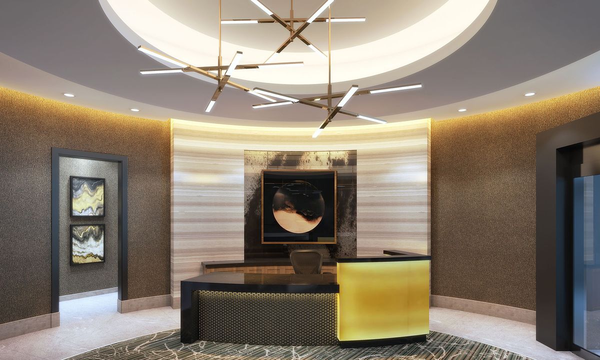 A luxurious modern lobby with stylish lighting and sleek furniture.